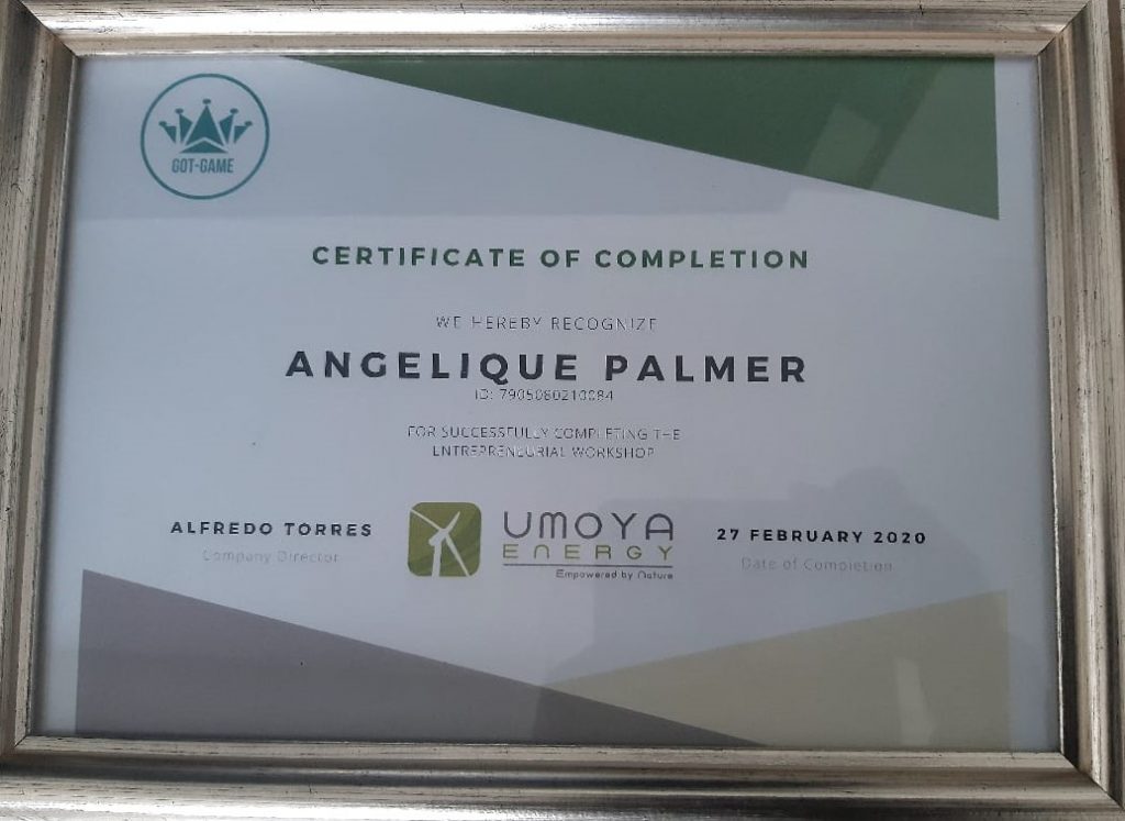 Umoya Energy awarding Masiqhame Trading 641 CC a Certificate of Completion.